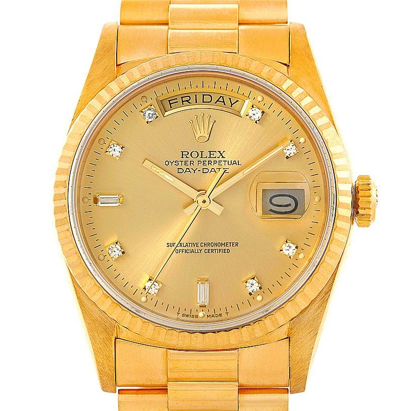 This image shows a front view of the Rolex President 18238 Men
s Yellow Gold Champagne Dial 18238 Men
s Yellow Gold Champagne Dial model watch, featuring its dial, day-date display, crown, and part of the bracelet.