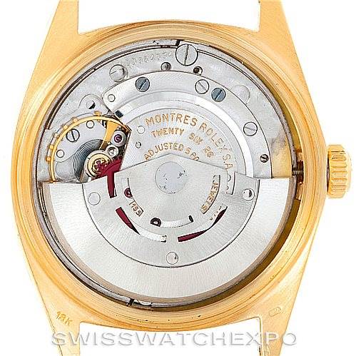 This is a Rolex President 1807 Men
s Yellow Gold Silver Dial 1807 Men
s Yellow Gold Silver Dial model watch shown from the back, displaying its internal mechanics and movement.