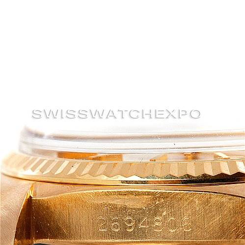 The image shows a close-up side view of the bezel and crystal of a Rolex President 1807 Men
s Yellow Gold Silver Dial 1807 Men
s Yellow Gold Silver Dial model watch.