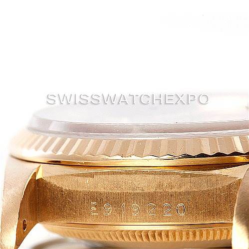 This image shows a close-up side view of the case and bezel of a Rolex President 18238 Men
s Yellow Gold Champagne Dial 18238 Men
s Yellow Gold Champagne Dial model watch, displaying the serial number.