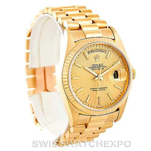 This image shows a Rolex President 18238 Men
s Yellow Gold Champagne Dial 18238 Men
s Yellow Gold Champagne Dial model watch at a three-quarter angle, displaying the dial, bezel, bracelet, and day/date windows.