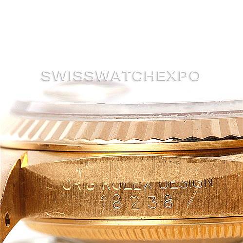 This image shows a close-up side view of the gold case and fluted bezel of a Rolex President 18238 Men
s Yellow Gold Champagne Dial 18238 Men
s Yellow Gold Champagne Dial model, highlighting the "ORIG ROLEX DESIGN 18238" engraving.
