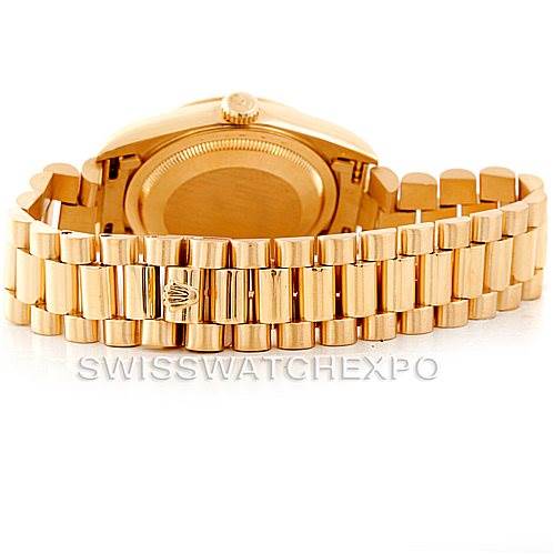 This image shows the backside of a Rolex President 18238 Men
s Yellow Gold Champagne Dial 18238 Men
s Yellow Gold Champagne Dial model watch, highlighting the case back and the gold bracelet.