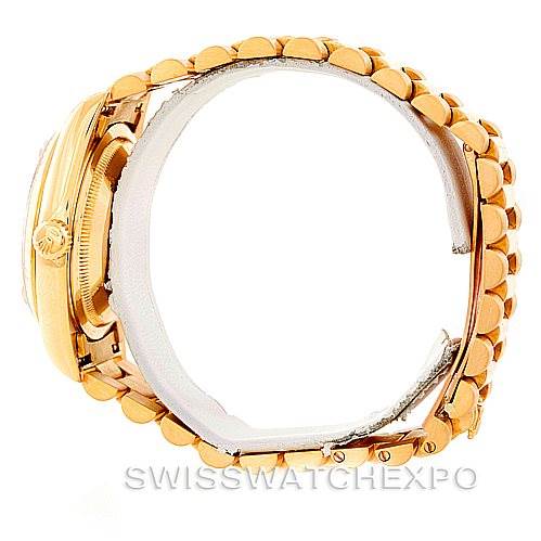 Side-angle view of a Rolex President 18238 Men
s Yellow Gold Champagne Dial 18238 Men
s Yellow Gold Champagne Dial watch, highlighting the bracelet, bezel, and crown.