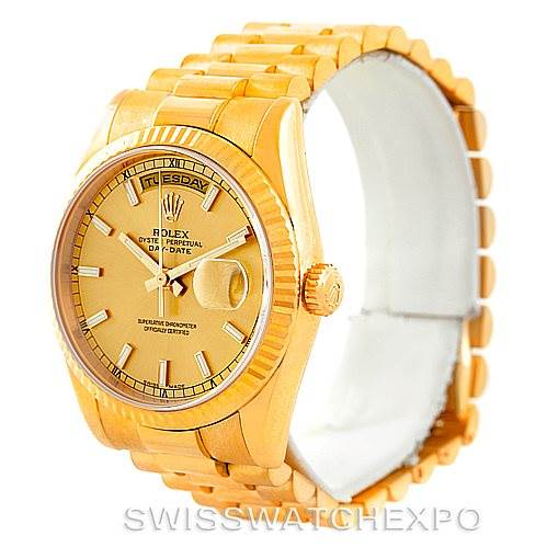 This image shows a Rolex President 118238 Men's Yellow Gold Champagne Dial 118238 Men's Yellow Gold Champagne Dial model watch from an angled front view, highlighting its golden bracelet and dial.