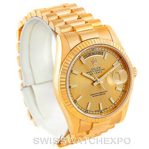 This image shows a gold Rolex President 118238 Men's Yellow Gold Champagne Dial 118238 Men's Yellow Gold Champagne Dial model watch at an angle highlighting its face, band, and side.