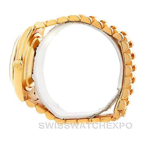 This image shows a side view of a Rolex President 118238 Men's Yellow Gold Champagne Dial 118238 Men's Yellow Gold Champagne Dial model watch, highlighting its gold bracelet and side case.