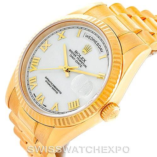 This image shows a close-up, angled view of the dial, bezel, crown, and bracelet of a Rolex President 118238 Men's Yellow Gold White Dial 118238 Men's Yellow Gold White Dial model watch.