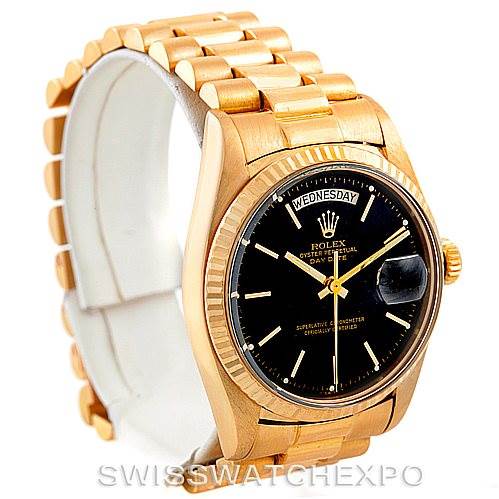 This image shows a Rolex President 1803 Men's Yellow Gold Black Dial 1803 Men's Yellow Gold Black Dial model watch from an angled view, displaying its bracelet, black dial, and the day-date functions.