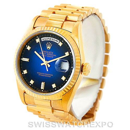 This image shows a President model Rolex watch from an angled front view, displaying the dial, bezel, and part of the bracelet.