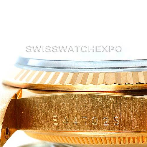 This image shows a close-up of the side of a Rolex President 18238 Men's Yellow Gold Blue Dial 18238 Men's Yellow Gold Blue Dial model watch, focusing on the case and serial number.