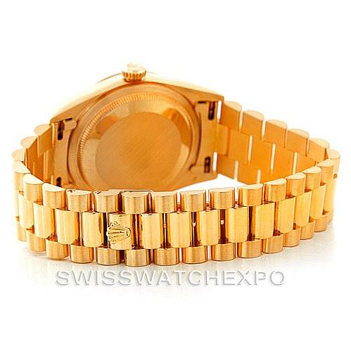 This is a rear view of the Rolex President 18238 Men's Yellow Gold Blue Dial 18238 Men's Yellow Gold Blue Dial model, showing the case back and part of the bracelet with the clasp.