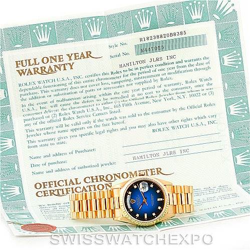 The image shows a Rolex President 18238 Men's Yellow Gold Blue Dial 18238 Men's Yellow Gold Blue Dial model watch laid flat on an official chronometer certification and warranty document.