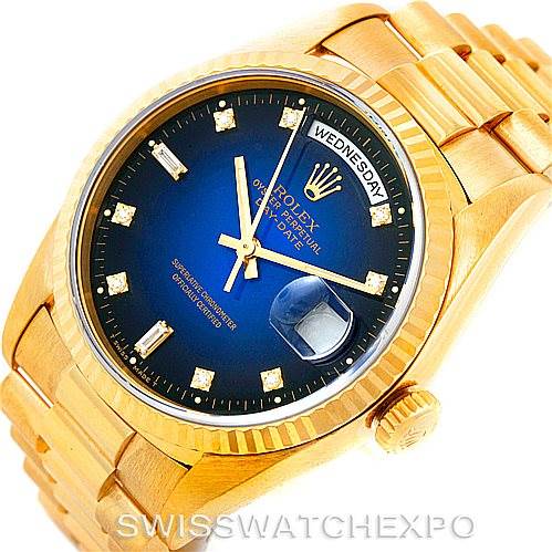 The image shows a Rolex President 18238 Men's Yellow Gold Blue Dial 18238 Men's Yellow Gold Blue Dial model watch from an oblique angle, highlighting the face, crown, and bracelet.