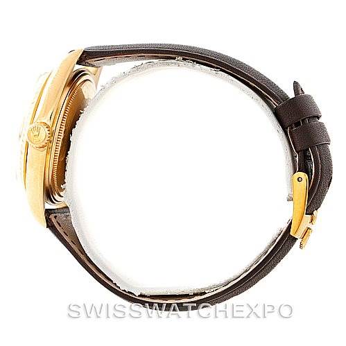 The image shows a side view of the Rolex President 1803 Men
s Yellow Gold Champagne Dial 1803 Men
s Yellow Gold Champagne Dial model watch, highlighting its gold case and brown leather strap.