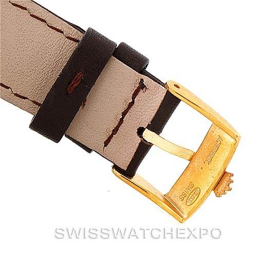 This image shows the buckle and part of the leather strap of a Rolex President 1803 Men
s Yellow Gold Champagne Dial 1803 Men
s Yellow Gold Champagne Dial model watch.