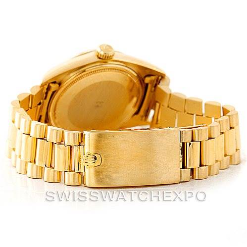 This image shows the back view of the Rolex President 1803 Men
s Yellow Gold Champagne Dial 1803 Men
s Yellow Gold Champagne Dial model watch, focusing on the clasp and the bracelet.