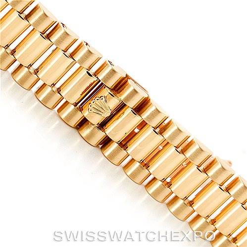 The image shows a close-up of the bracelet links of a Rolex President 18238 Men
s Yellow Gold Champagne Dial 18238 Men
s Yellow Gold Champagne Dial model watch.