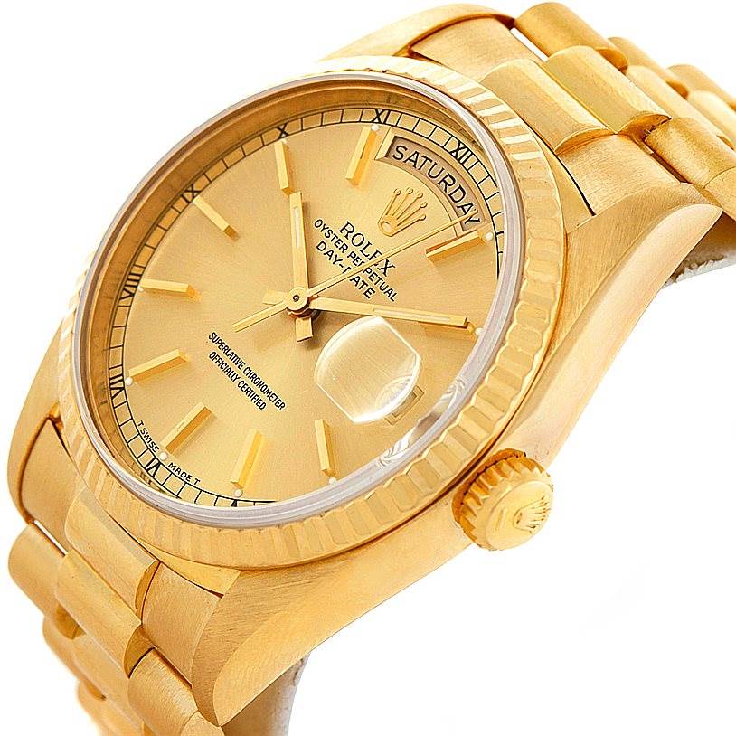 This image shows a close-up, angled view of the face, bezel, and part of the bracelet of the Rolex President 18238 Men
s Yellow Gold Champagne Dial 18238 Men
s Yellow Gold Champagne Dial watch.