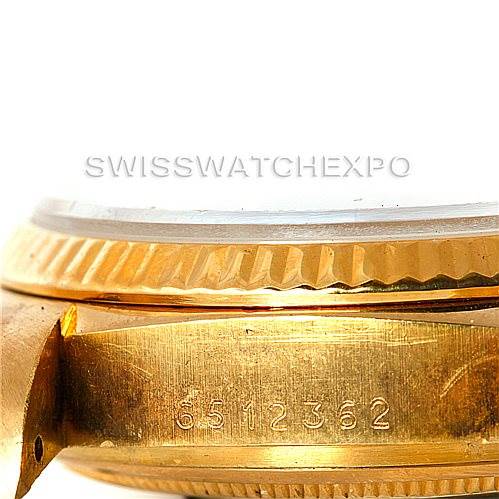 The image shows a close-up of the side of the case and bezel of a Rolex President 18038 Men
s Yellow Gold Champagne Dial 18038 Men
s Yellow Gold Champagne Dial model, highlighting the serial number.