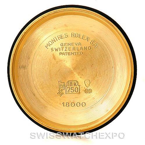 This image shows the interior case-back of a Rolex President 18038 Men
s Yellow Gold Champagne Dial 18038 Men
s Yellow Gold Champagne Dial model watch, displaying various engravings and hallmarks.