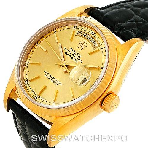 The image shows a Rolex President 18038 Men
s Yellow Gold Champagne Dial 18038 Men
s Yellow Gold Champagne Dial model watch from a left-side angle, highlighting the dial, crown, and part of the strap.