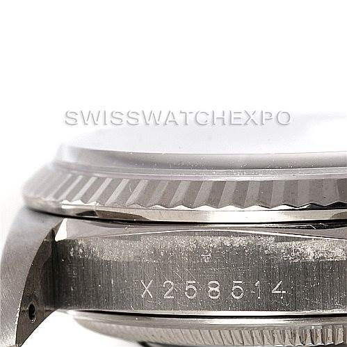 This close-up shows the side profile of a Rolex President 18239 Men's White Gold White Dial 18239 Men's White Gold White Dial model watch, highlighting the etched serial number and bezel.