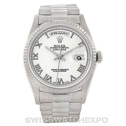 The image shows a frontal view of a Rolex President 18239 Men's White Gold White Dial 18239 Men's White Gold White Dial model watch, displaying the face, bezel, crown, and part of the bracelet.
