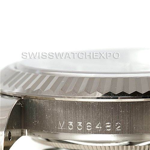 This image shows a close-up side view of the bezel and case of a Rolex President 218239 Men's White Gold Silver Dial 218239 Men's White Gold Silver Dial model watch.
