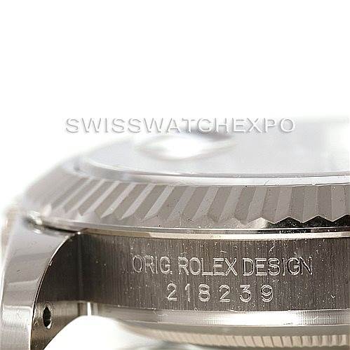 This image shows a close-up side view of the case of the Rolex President 218239 Men's White Gold Silver Dial 218239 Men's White Gold Silver Dial model, highlighting the serial number engraving.