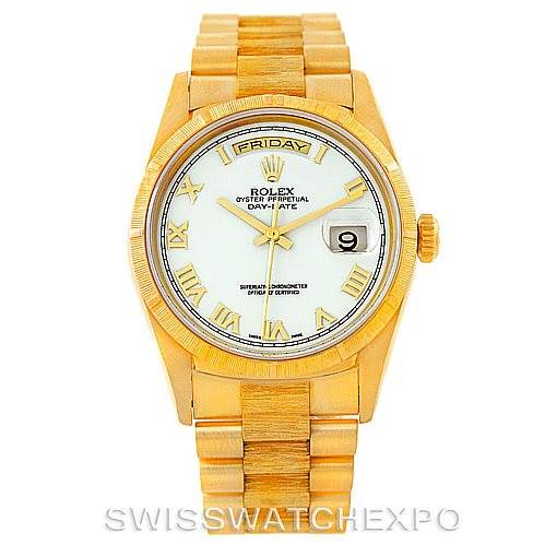 The Rolex President 18248 Men
s Yellow Gold White Dial 18248 Men
s Yellow Gold White Dial model watch is shown from a front angle, displaying the face, bracelet, and bezel.