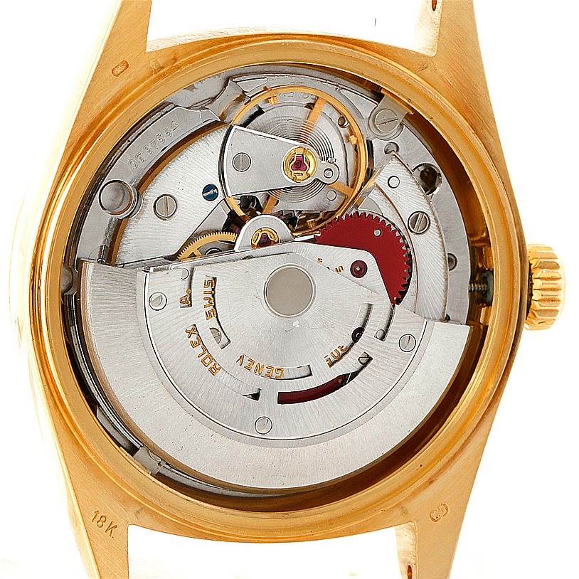 The image shows the internal mechanism of a Rolex President 18038 Men
s Yellow Gold Brown Dial 18038 Men
s Yellow Gold Brown Dial model watch, viewed from the case back.