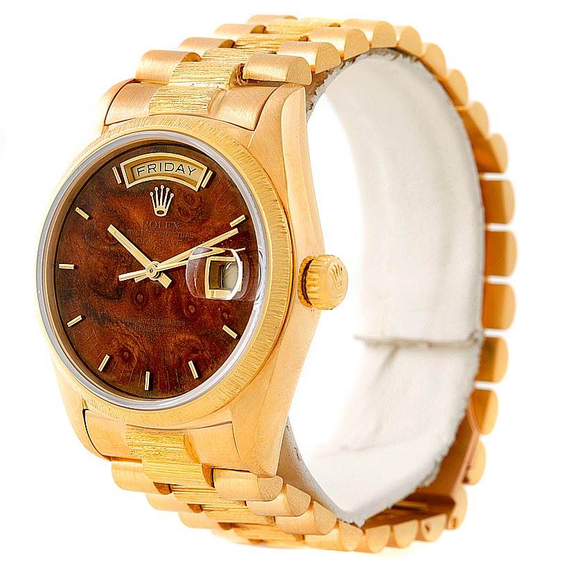 The image shows a gold Rolex President 18038 Men
s Yellow Gold Brown Dial 18038 Men
s Yellow Gold Brown Dial model watch at a three-quarter angle, showcasing the face, bezel, crown, and part of the bracelet.