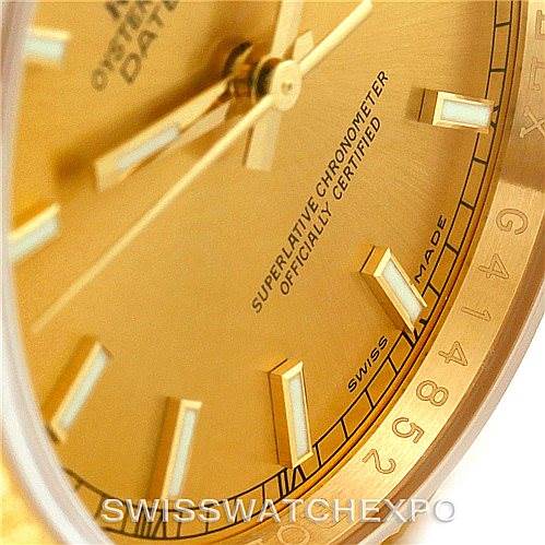 The image shows a close-up of the dial and some hour markers of the Rolex President 116238 Men
s Yellow Gold Champagne Dial 116238 Men
s Yellow Gold Champagne Dial model watch.