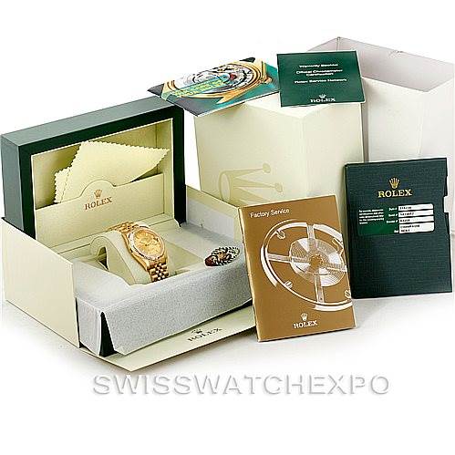 This image shows a Rolex President 116238 Men
s Yellow Gold Champagne Dial 116238 Men
s Yellow Gold Champagne Dial model watch with its original packaging, cleaning cloth, manuals, and service booklet.