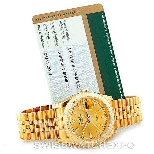 This image shows a gold Rolex President 116238 Men
s Yellow Gold Champagne Dial 116238 Men
s Yellow Gold Champagne Dial model watch from a front angle, alongside its warranty card.