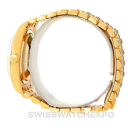 This image shows a side view of a Rolex President 116238 Men
s Yellow Gold Champagne Dial 116238 Men
s Yellow Gold Champagne Dial model watch, highlighting the bezel, case, and gold link bracelet.