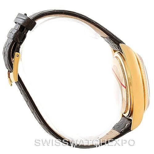 This side view shows the case, crown, bezel, and leather strap of the Rolex President 18038 Men
s Yellow Gold Champagne Dial 18038 Men
s Yellow Gold Champagne Dial model watch.