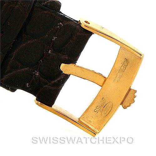 This image shows a close-up of the buckle and leather strap of a Rolex President 18038 Men
s Yellow Gold Champagne Dial 18038 Men
s Yellow Gold Champagne Dial model watch.