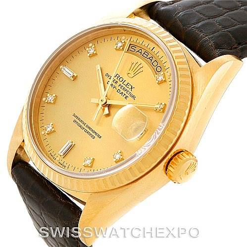 This image shows a close-up angle of the Rolex President 18038 Men
s Yellow Gold Champagne Dial 18038 Men
s Yellow Gold Champagne Dial watch, highlighting the dial, fluted bezel, crown, and leather strap.
