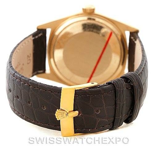 This image shows the back case and leather strap of a Rolex President 18038 Men
s Yellow Gold Champagne Dial 18038 Men
s Yellow Gold Champagne Dial model watch.