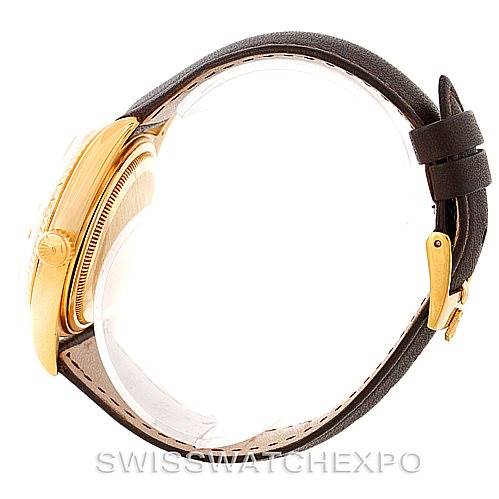 The image shows a side view of a Rolex President 1803 Men
s Yellow Gold Champagne Dial 1803 Men
s Yellow Gold Champagne Dial model watch, highlighting its gold case and leather strap.