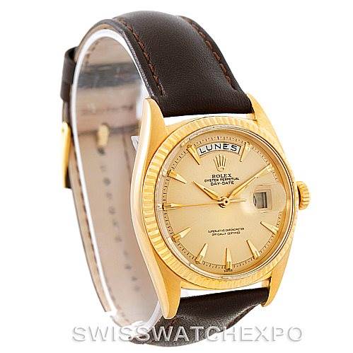 The image shows a Rolex President 1803 Men
s Yellow Gold Champagne Dial 1803 Men
s Yellow Gold Champagne Dial model watch from an angled front view, highlighting the dial, bezel, case, crown, and leather strap.