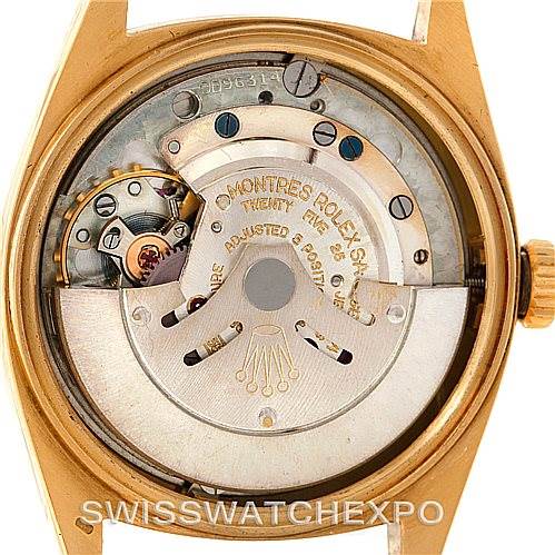 This is a view of the Rolex President 1803 Men
s Yellow Gold Champagne Dial 1803 Men
s Yellow Gold Champagne Dial model watch’s internal movement mechanism from the case back.