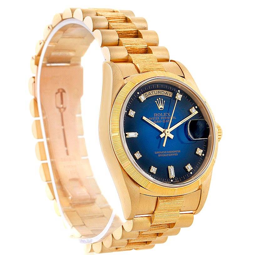 This image shows a side angle of the Rolex President 18248 Men's Yellow Gold Blue Dial 18248 Men's Yellow Gold Blue Dial model watch, highlighting its gold bracelet, blue dial, and day-date display.