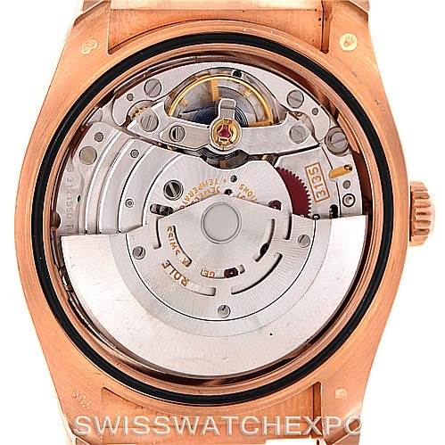 This image shows the movement and internal mechanism of a Rolex President 116185 Men's Rose Gold Mother of Pearl Dial 116185 Men's Rose Gold Mother of Pearl Dial model watch, viewed from the back.