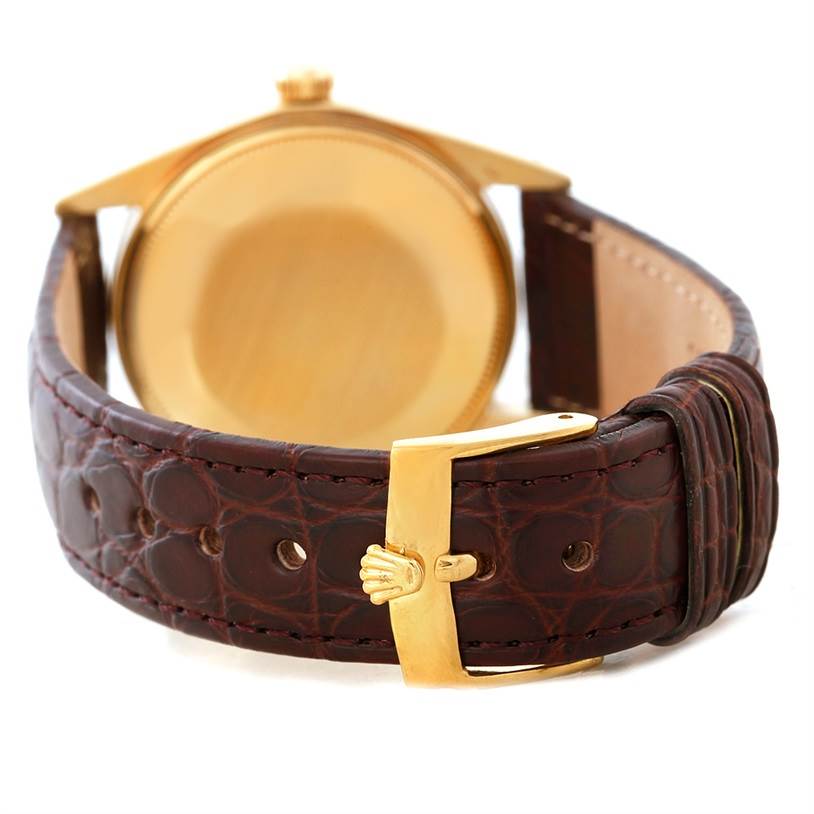The image shows the back case and leather strap with the clasp of a Rolex President 1503 Men
s Yellow Gold Champagne Dial 1503 Men
s Yellow Gold Champagne Dial model watch.
