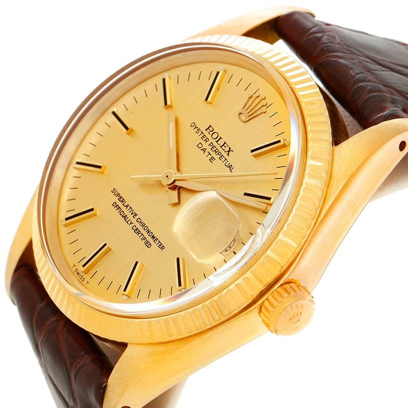The image shows a close-up angle of the Rolex President 1503 Men
s Yellow Gold Champagne Dial 1503 Men
s Yellow Gold Champagne Dial model, highlighting the gold dial, crown, and part of the leather strap.