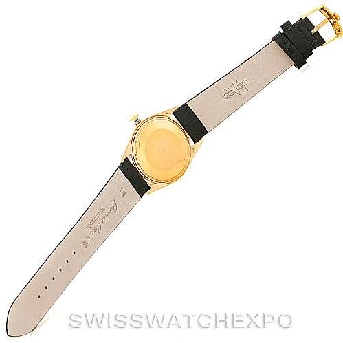 This image shows the backside of a Rolex President 1503 Men's Yellow Gold White Dial 1503 Men's Yellow Gold White Dial model watch with its leather strap fully extended, including the buckle and case back.