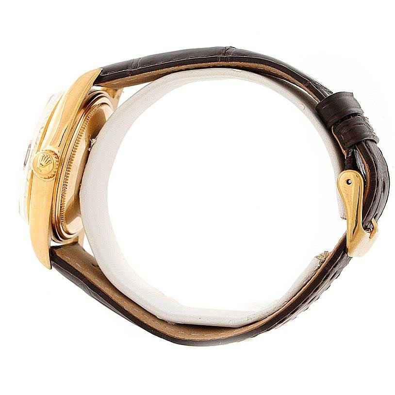 This image shows the side view of a Rolex President 1803 Men's Yellow Gold Brown Dial 1803 Men's Yellow Gold Brown Dial watch, highlighting the crown, case, and leather strap with buckle.